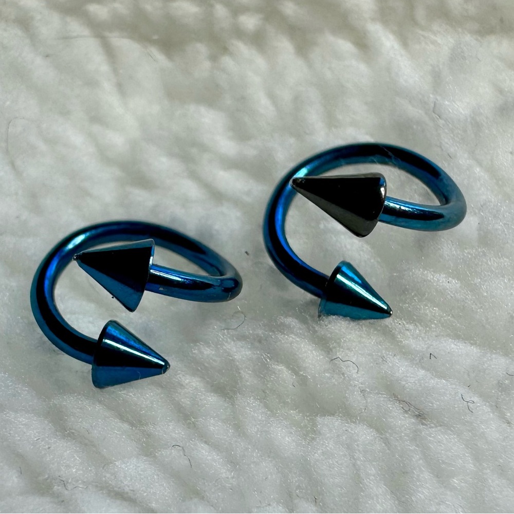 2 twist piercings